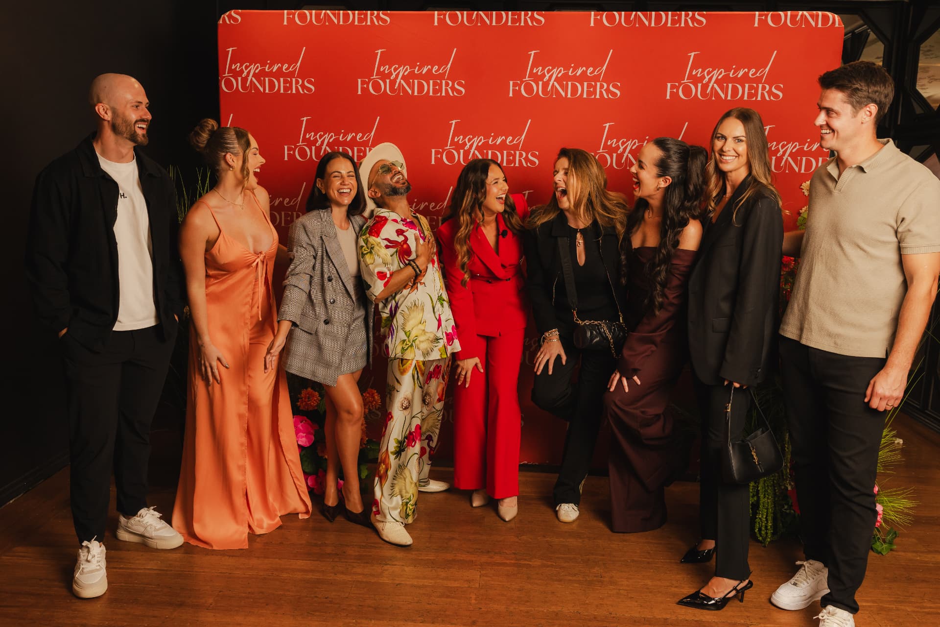 The Inspired Founders community together on the event step and repeat